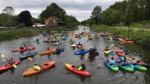 Multiple kayaks in a flotilla