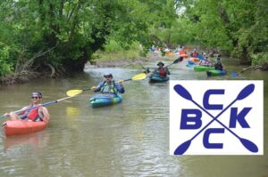 Paddleboats in tree-lined Beaver Creek