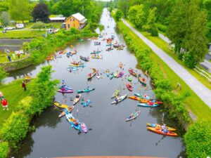 BoardSafe Docks Chittenango Landing aerial view of many kayaks on water