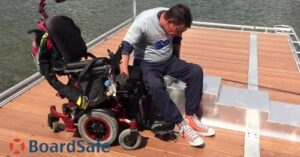 Man exiting wheelchair on BoardSafe floating dock