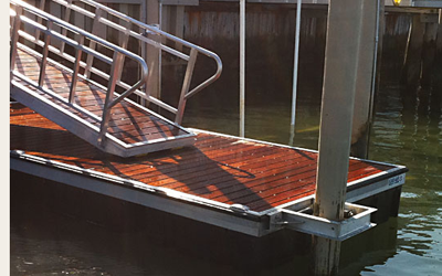Composite Decking vs. Pressure-Treated Lumber for Docks and Piers