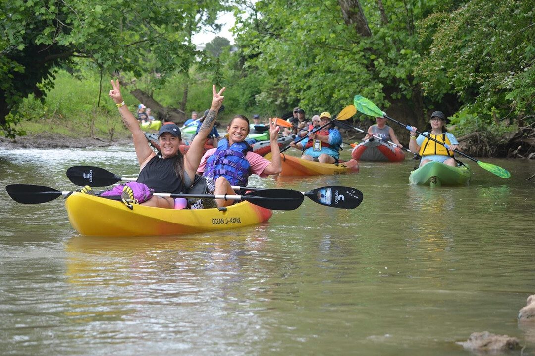 adaptive kayakers with victory sign Beaver Creek