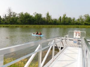 Manlius NY dock and kayaker on lake