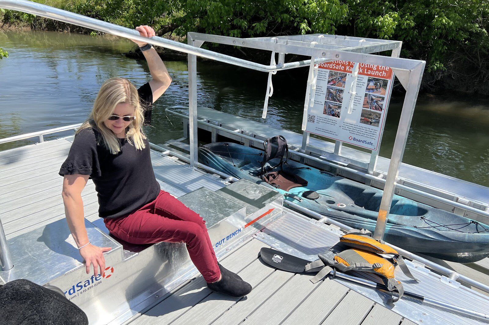 woman using adaptive kayak launch