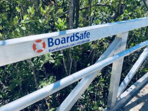 BoardSafe Docks logo on launch railing