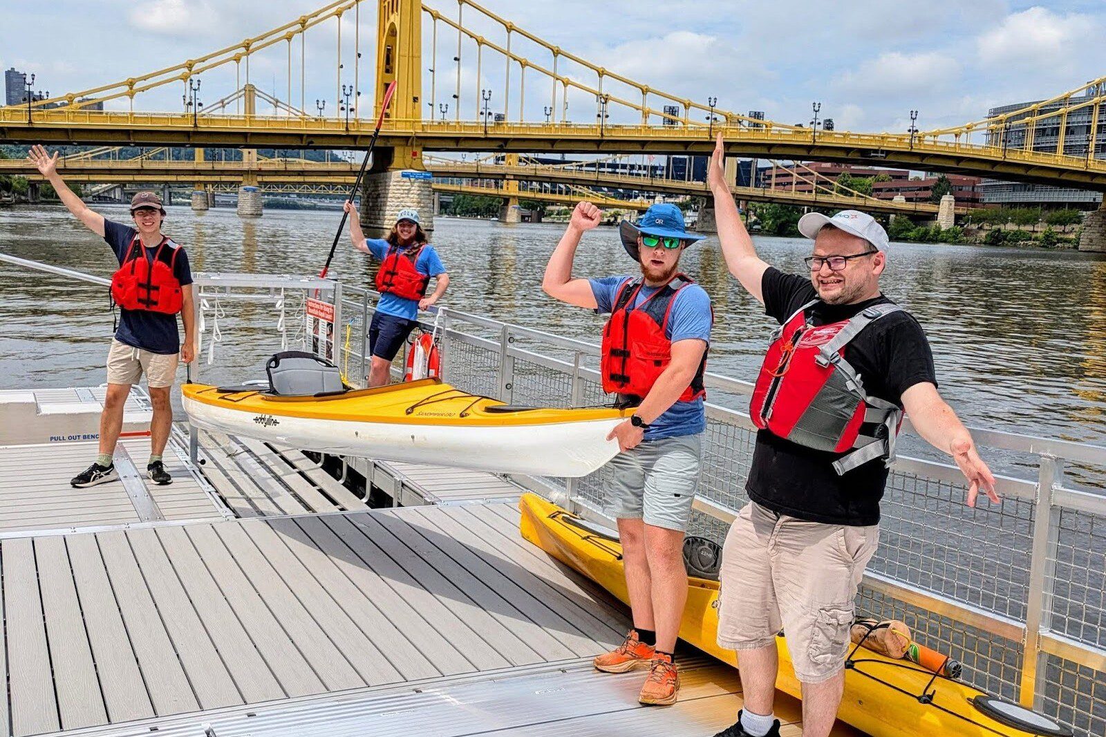 Venture Outdoors Pittsburgh men on dock with kayak