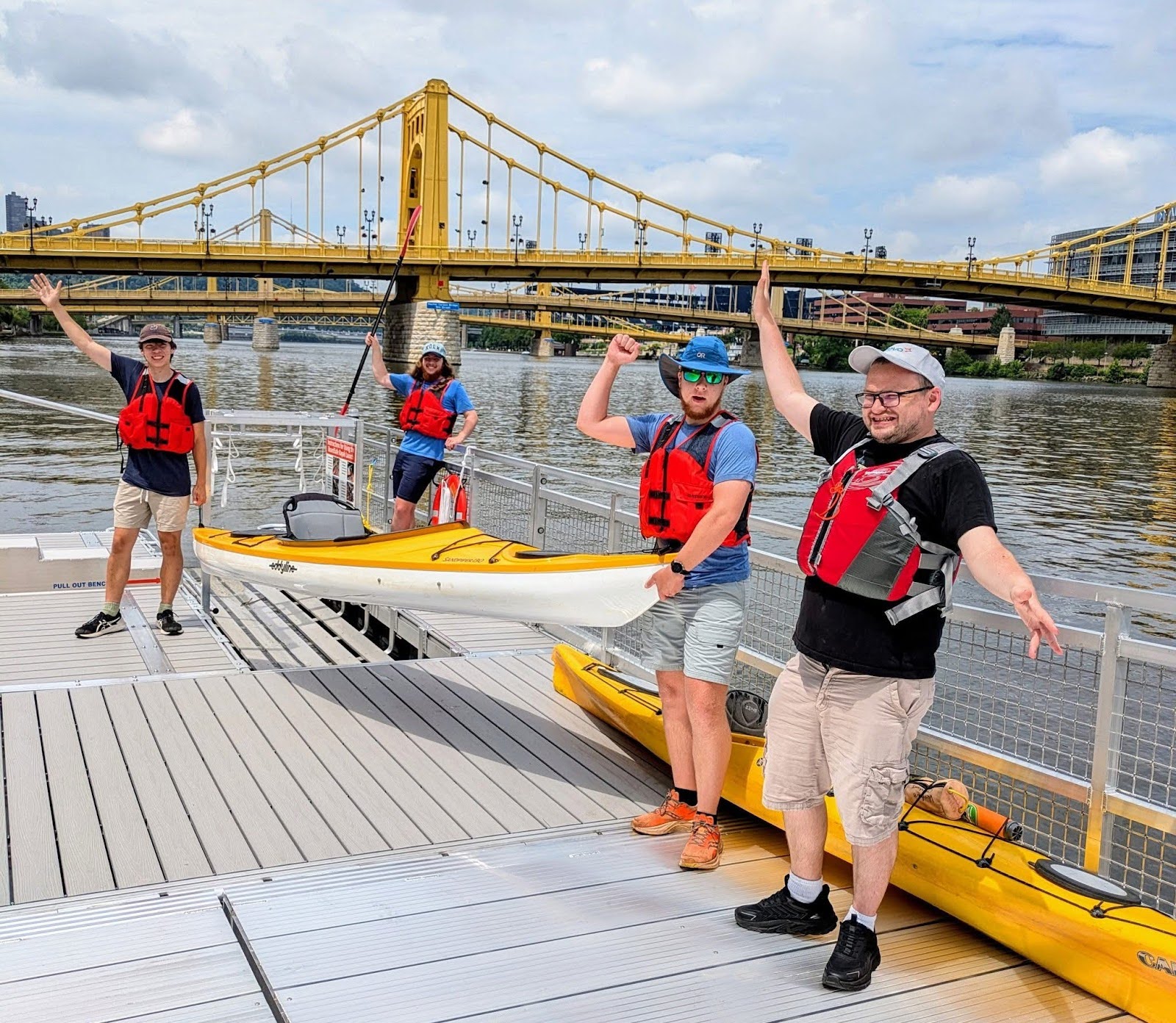Venture Outdoors Pittsburgh men on dock with kayak